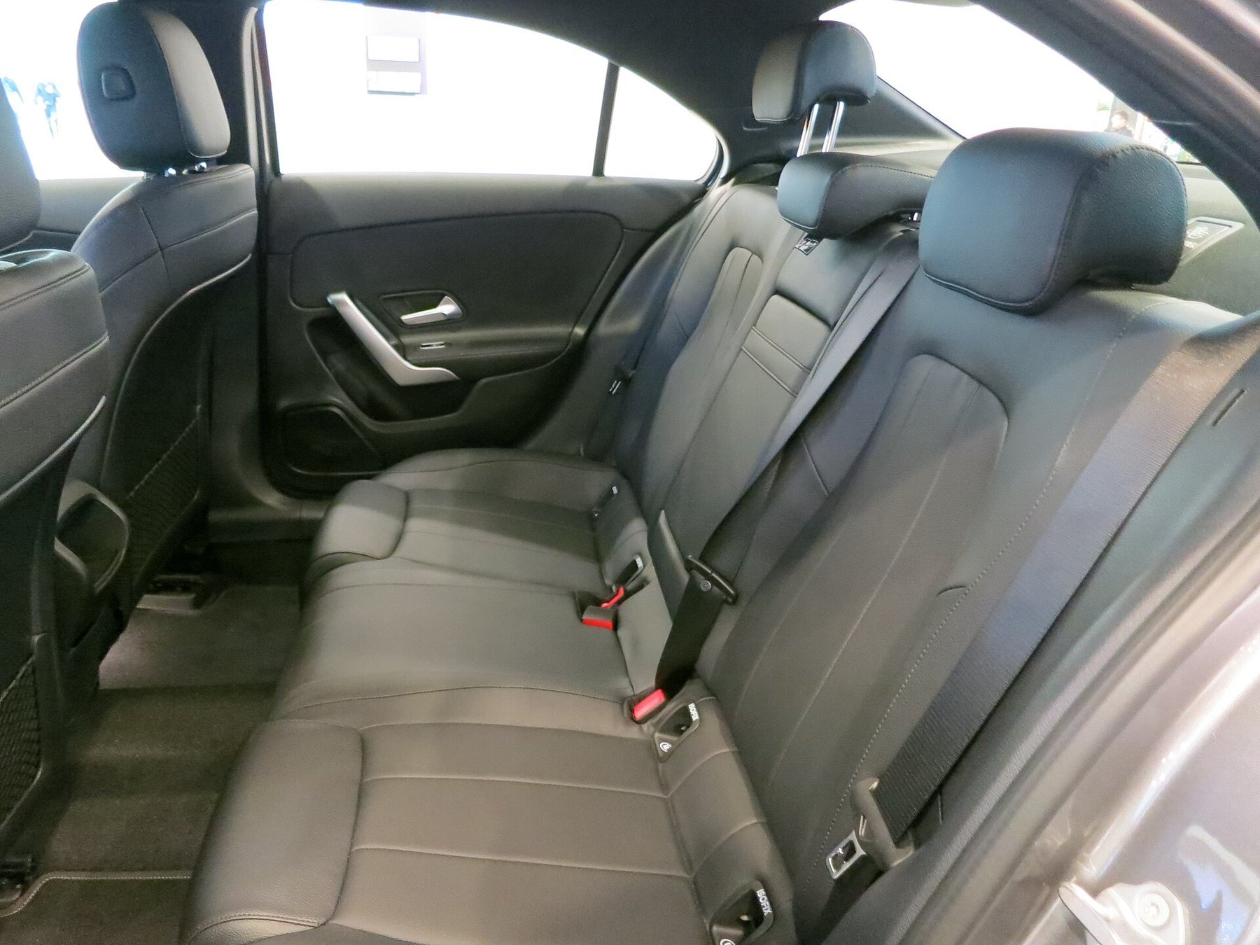 Passenger seating inside a sedan
