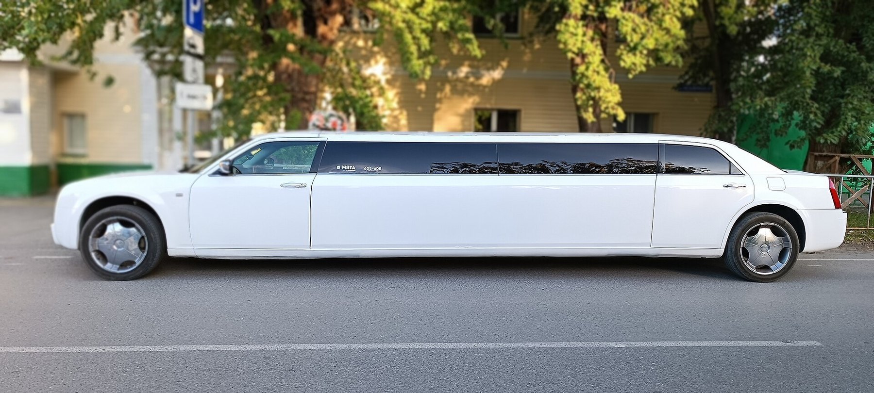 Long white limousine viewed from the side